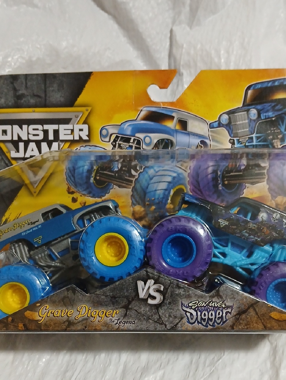 Grave Digger vs Son-Uva Digger 2-Pack Monster Jam Toy Trucks - Blue & Purple
